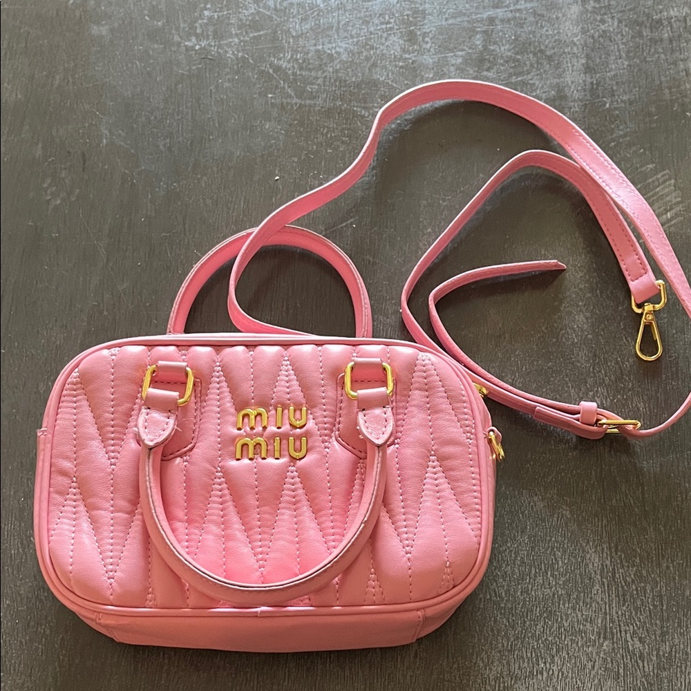 Miu Miu Pink Quilted Crossbody Bag
Fit this bag from facebook marketplace